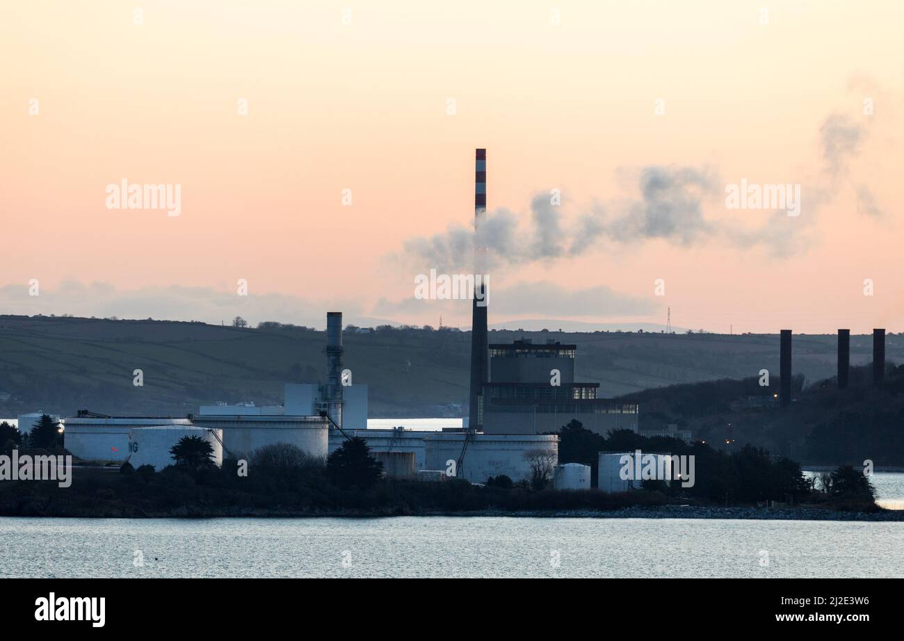 Whitegate, Cork, Ireland. 01st April, 2022.An early morning view of the ESB power station in Aghada as well as the storage tanks for the oil refinery in Whitgate, Co. Cork, Ireland. - Credit; David Creedon / Alamy Live News Stock Photo