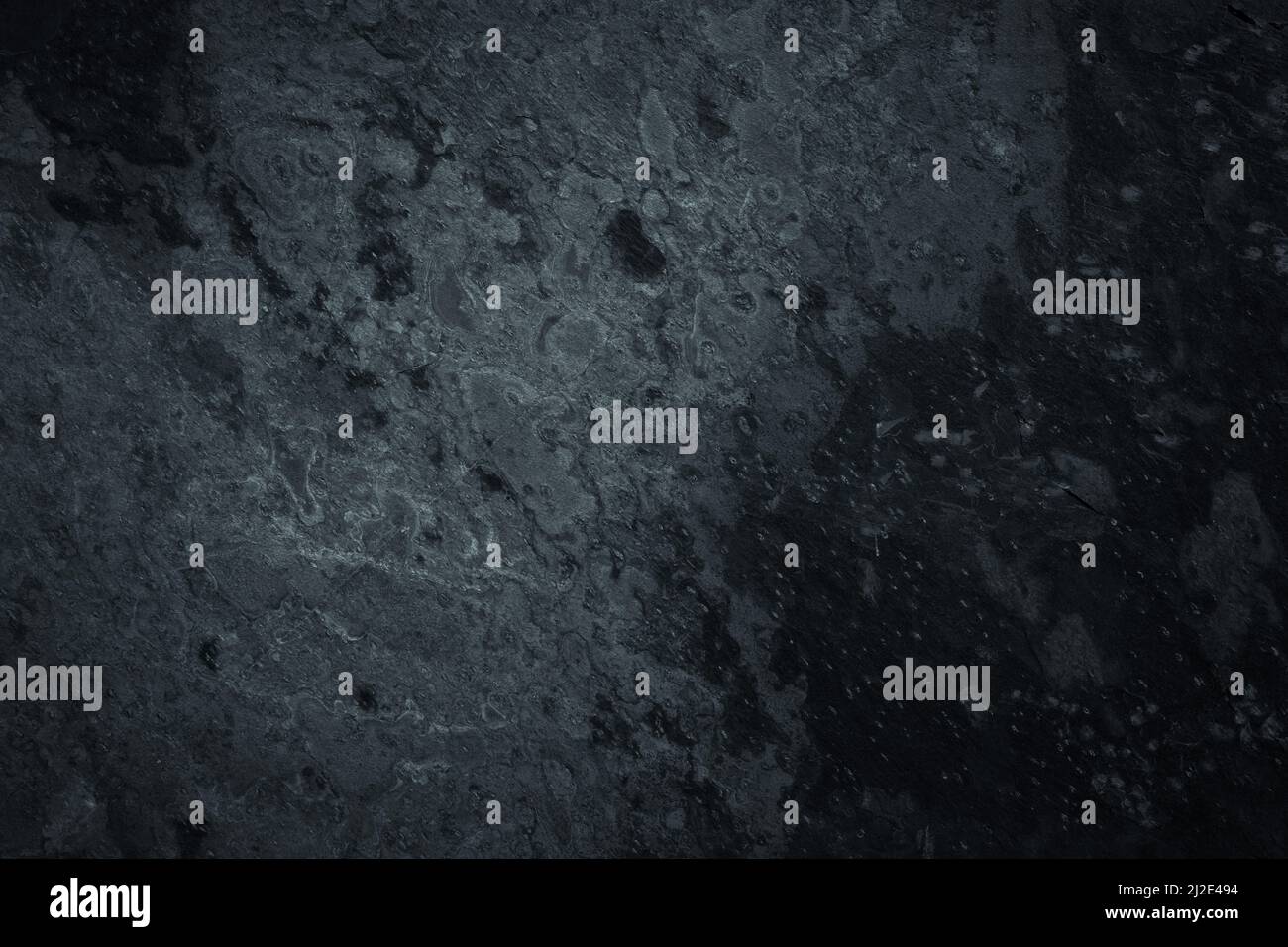 Dark worn grey and black slate background or texture Stock Photo