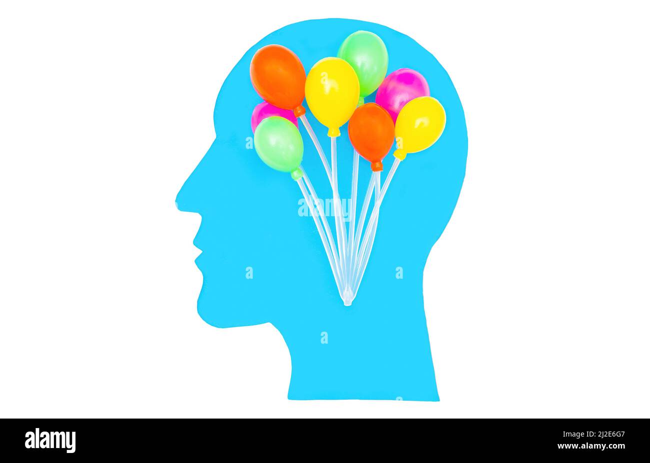 Light blue man's head profile silhouette with a bunch of prop party balloons isolated on white. Birthday party ideas concept. Stock Photo