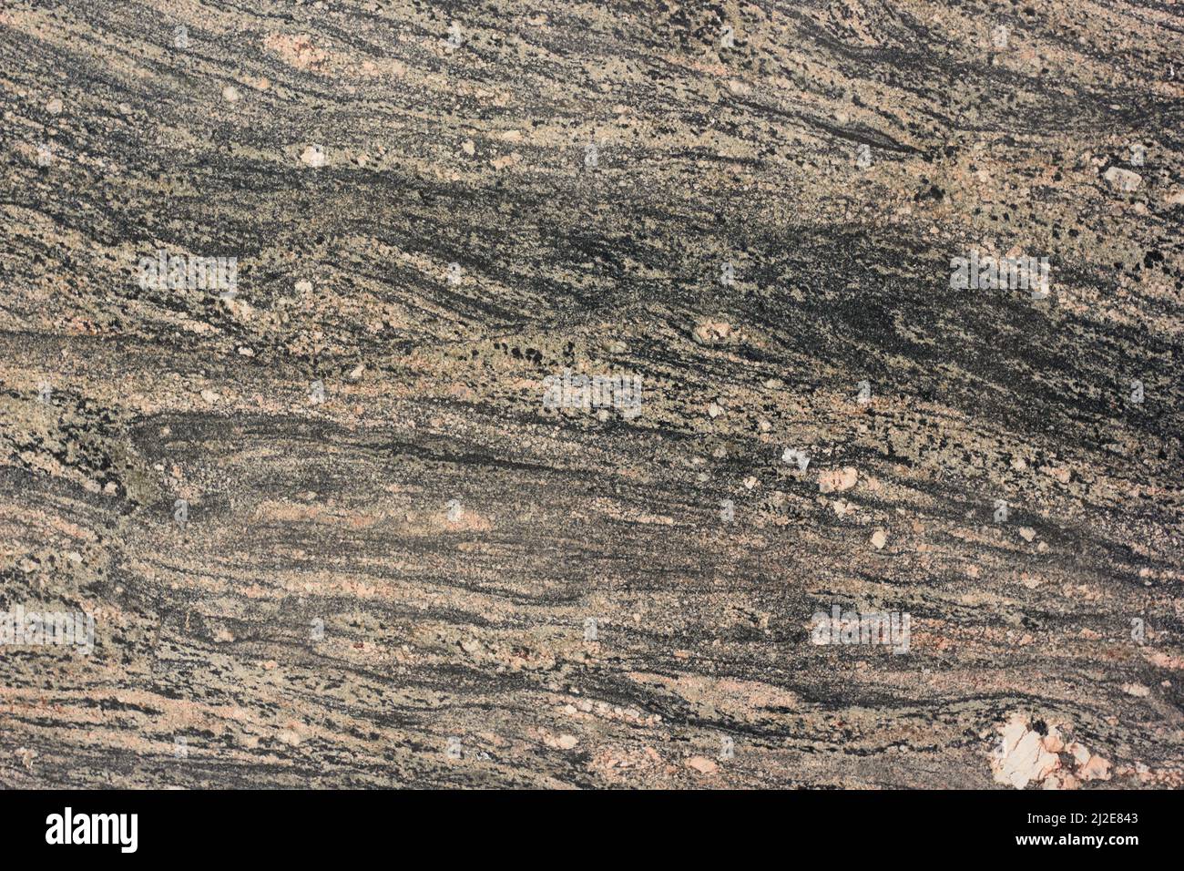 Image showcasing Full frame closeup of a granite stone veneer panel Stock Photo - Alamy