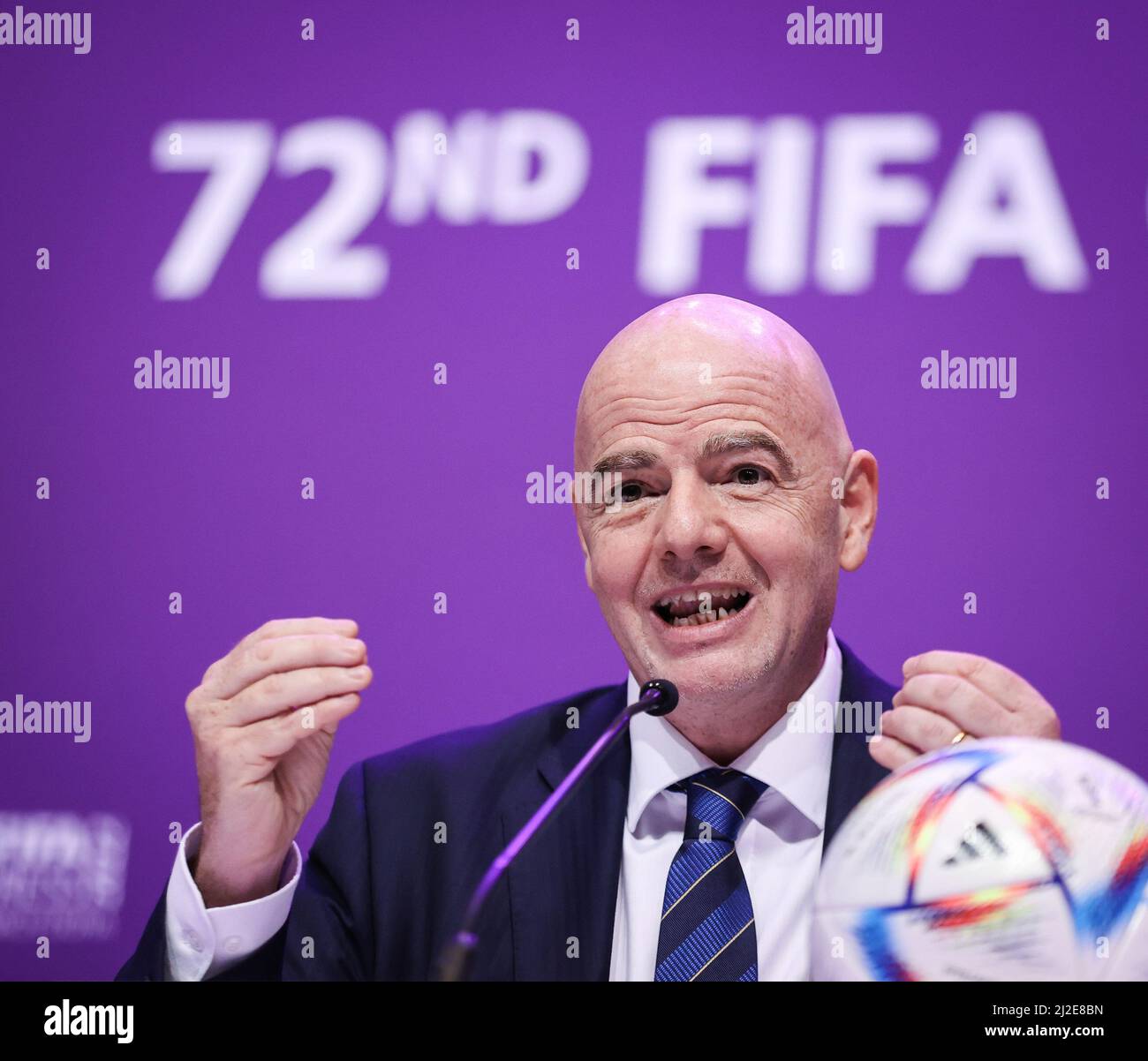 Doha, Qatar. 31st Mar, 2022. Soccer: FIFA Congress 2022. Fifa President Gianni Infantino speaks at a press conference after the Fifa Congress at the Doha Exhibition & Convention Center (DECC). In front of him on the podium is the official match ball "Al Rihla" ("the journey" in Arabic) for the 2022 World Cup in Qatar. Credit: Christian Charisius/dpa/Alamy Live News Stock Photo