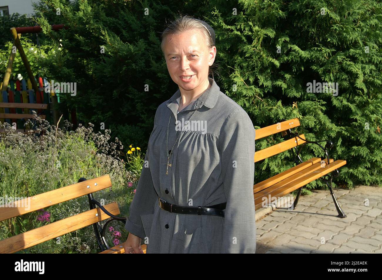 Augustów, Poland, Polen, Polska, Portrait of a smiling nun in the park. Porträt einer lächelnden Nonne im Park. Uśmiechnięta zakonnica w parku Stock Photo