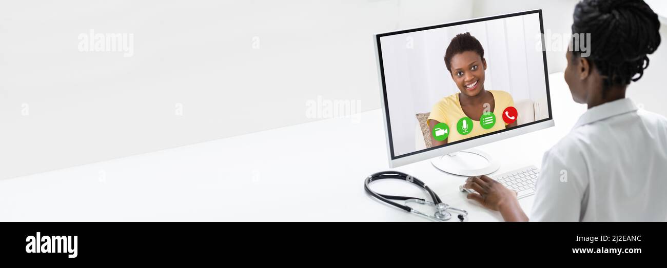 African Doctor In Video Conference Call Talking With Patient Stock Photo