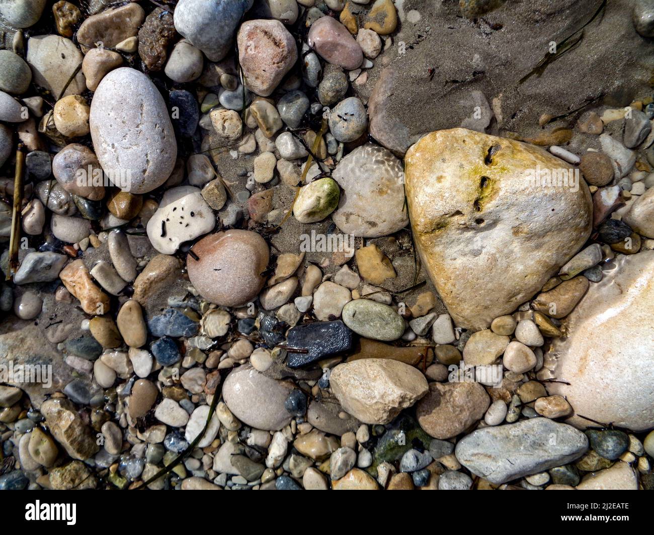 Random patterns in nature, small beach pebbles on the Costa Blanca ...
