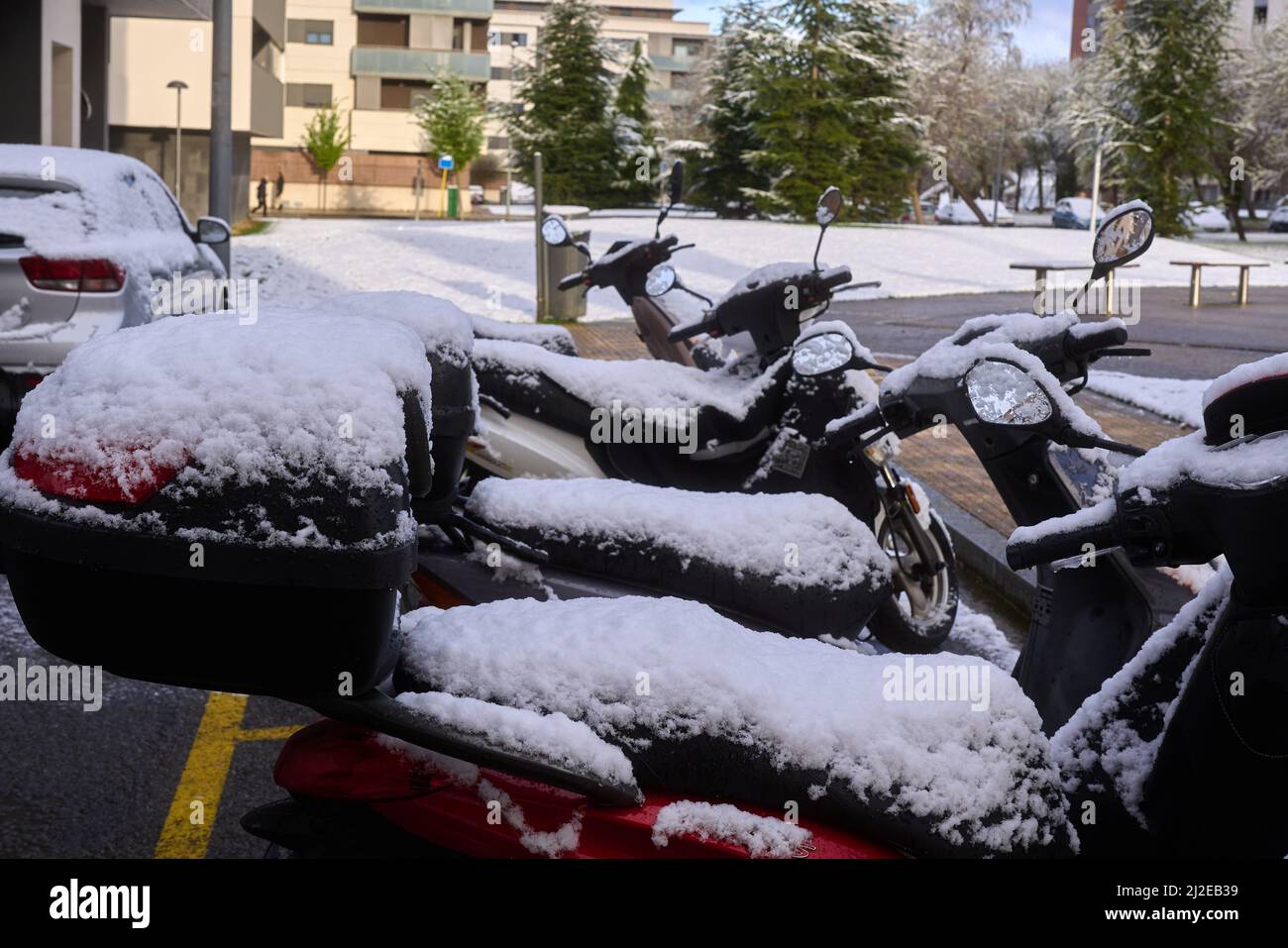 Pamplona, Navarra Spain april 01 2022, Surprise snowfall in early spring, vehicles covered in the snow Stock Photo