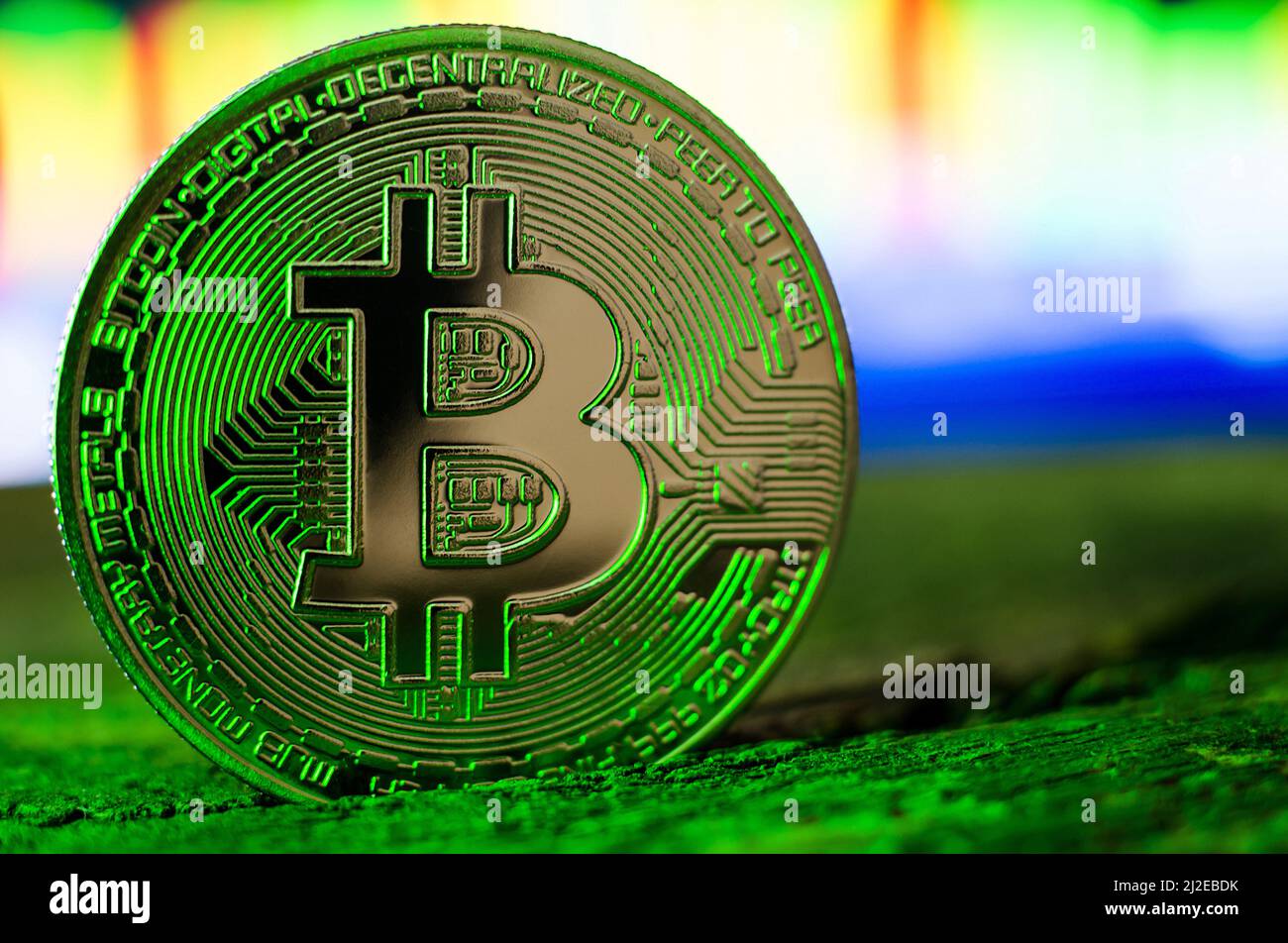 Bitcoin coin in green neon light close-up. World cryptocurrency. The  financial system of the future Stock Photo - Alamy