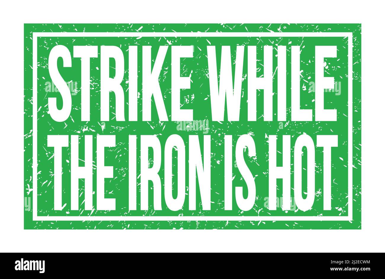 STRIKE WHILE THE IRON IS HOT, Words Written On Green Rectangle Stamp ...