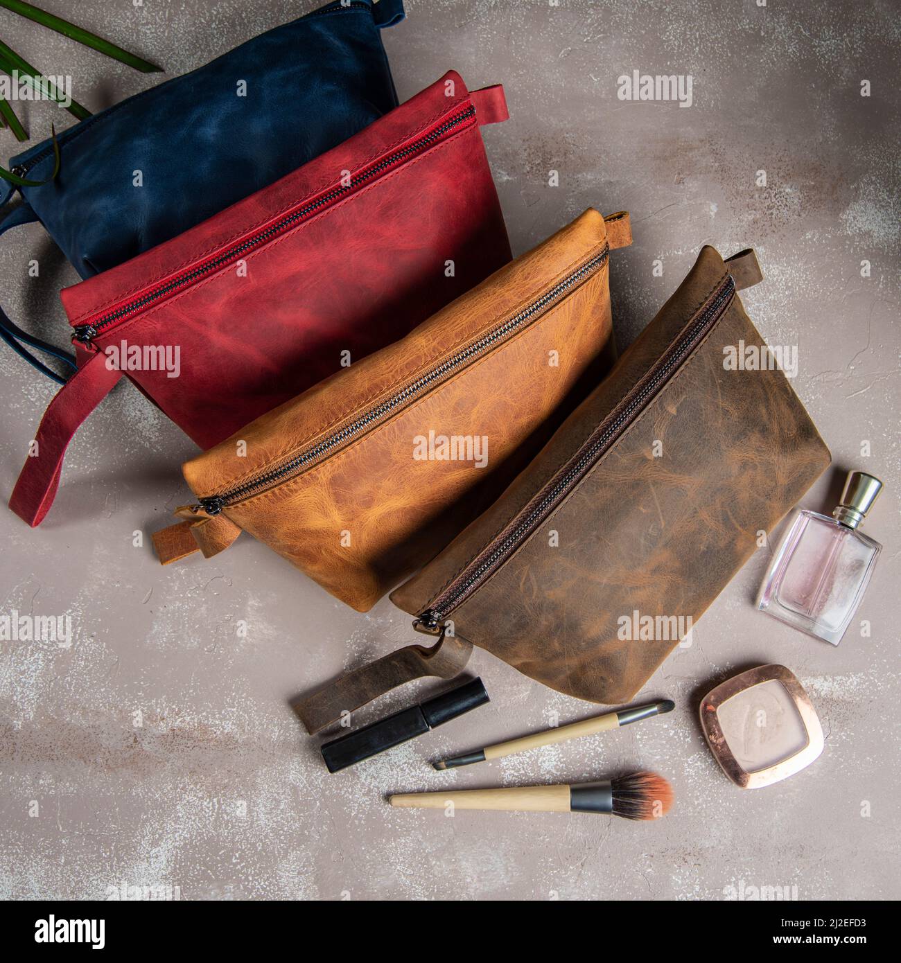 handmade leather makeup bags for everyday carry makeup kits Stock Photo