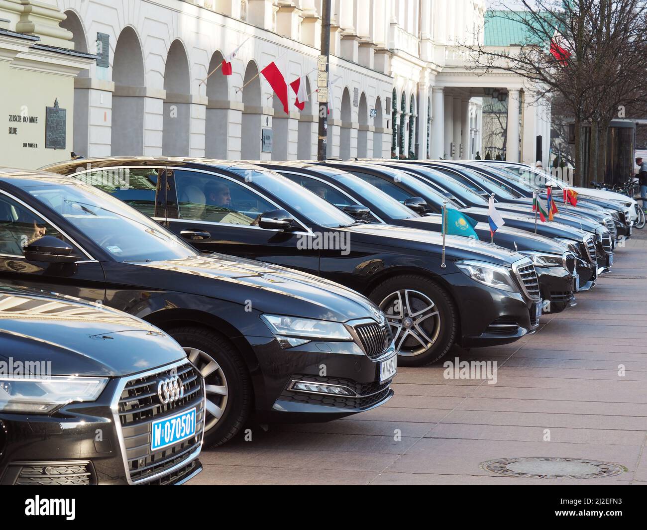 Diplomatic cars with flags Stock Photo - Alamy