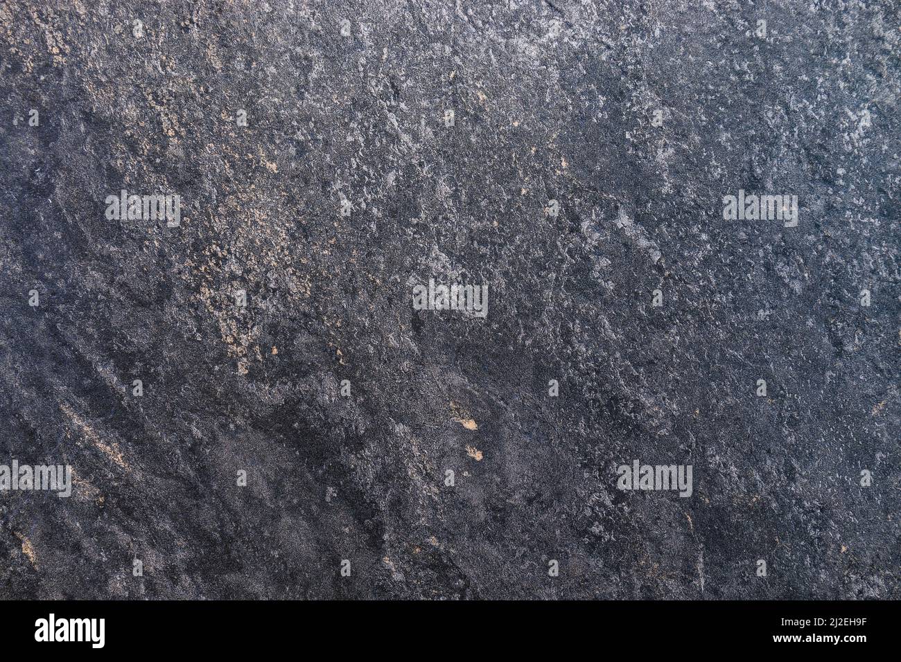 Stained rusty peeled textured wall surface background Stock Photo