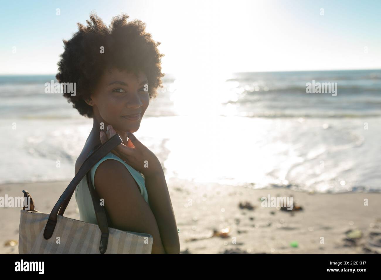 Side view smiling african woman hi-res stock photography and images - Alamy