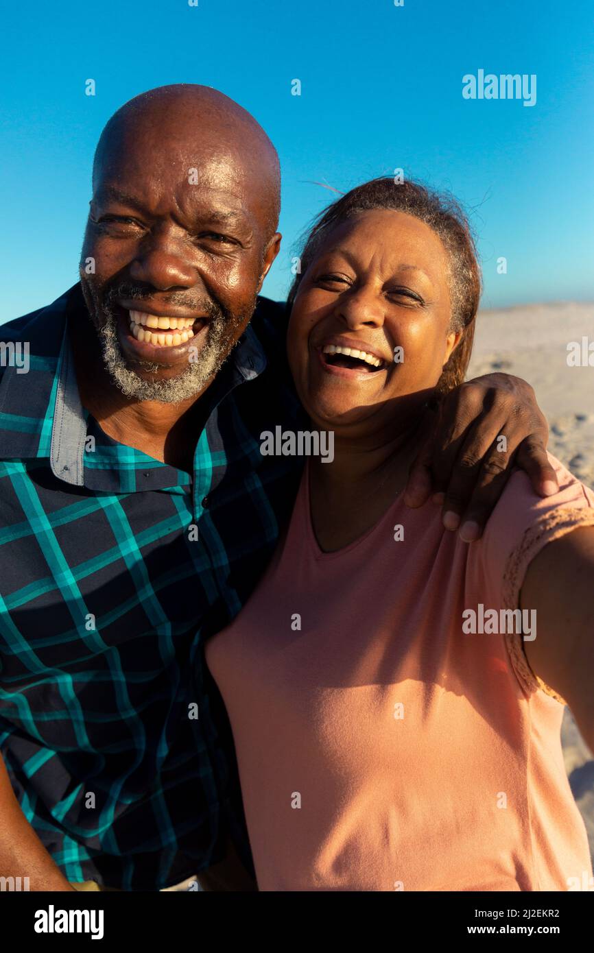 Portrait of happy retired african american senior couple enjoying ...