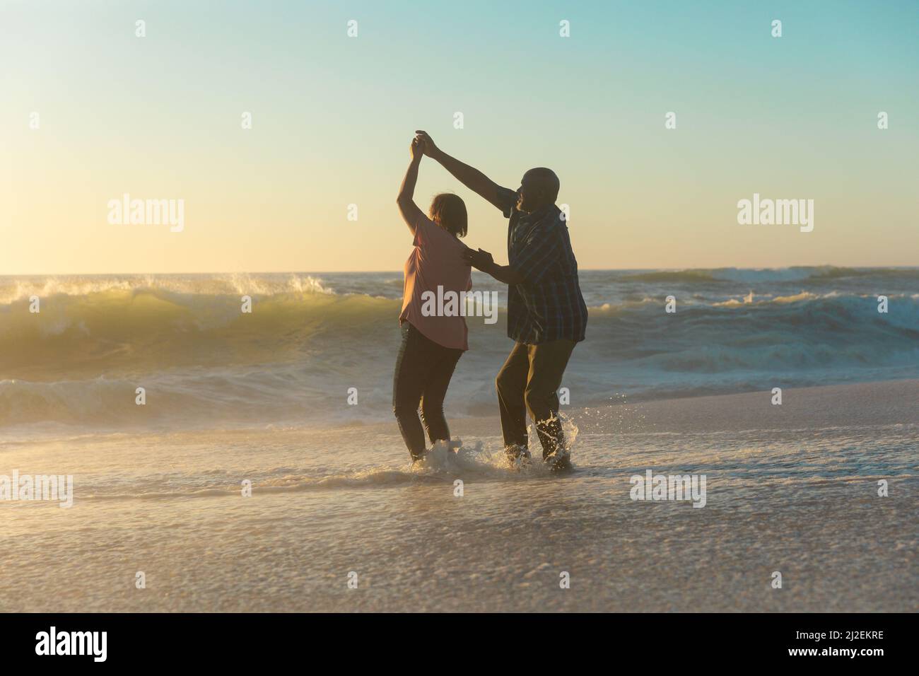 Happy retired couple dancing on hi-res stock photography and images - Alamy