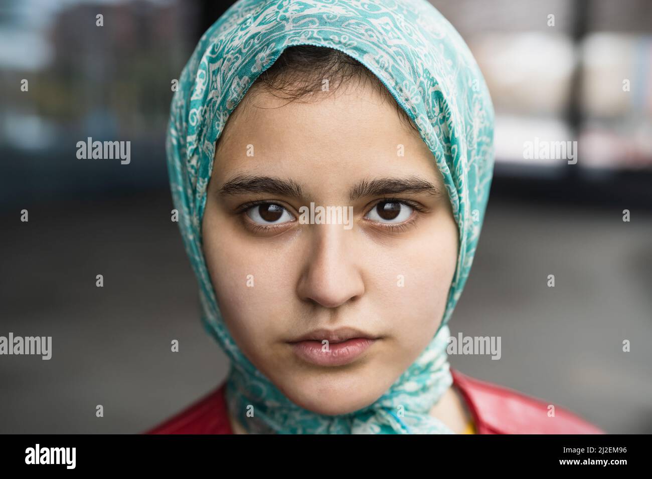 Closeup portrait of muslim girl looking in camera Stock Photo