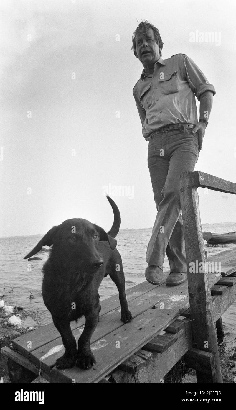 Culture/literature The writer Siegfried LENZ, stands on a jetty in the Baltic Sea, with dog, Lebollykke, 01.07.1973, Â Stock Photo