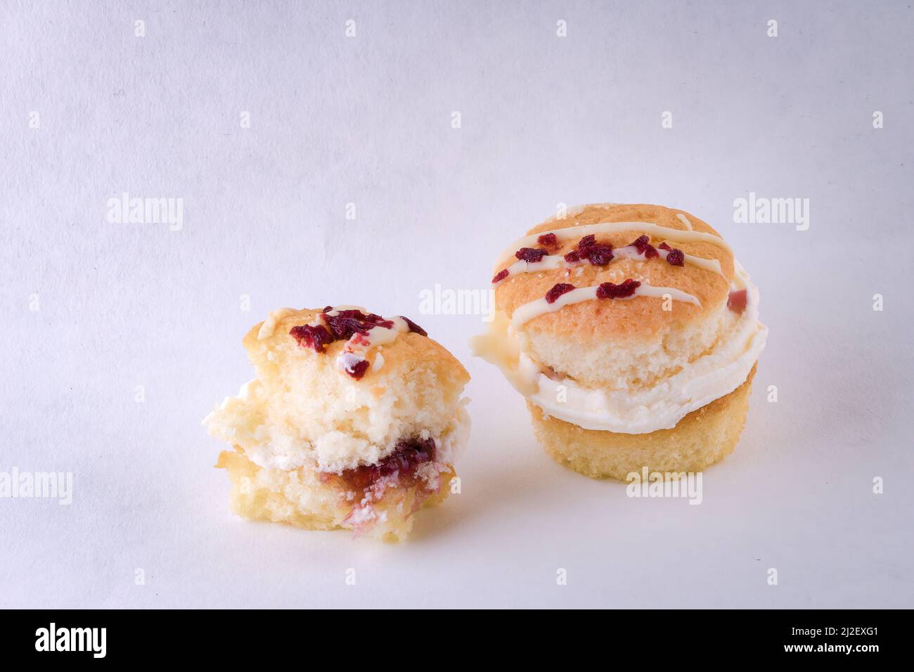 A delicious Bakewell Sponge Cake with buttercream and raspberry jam ...