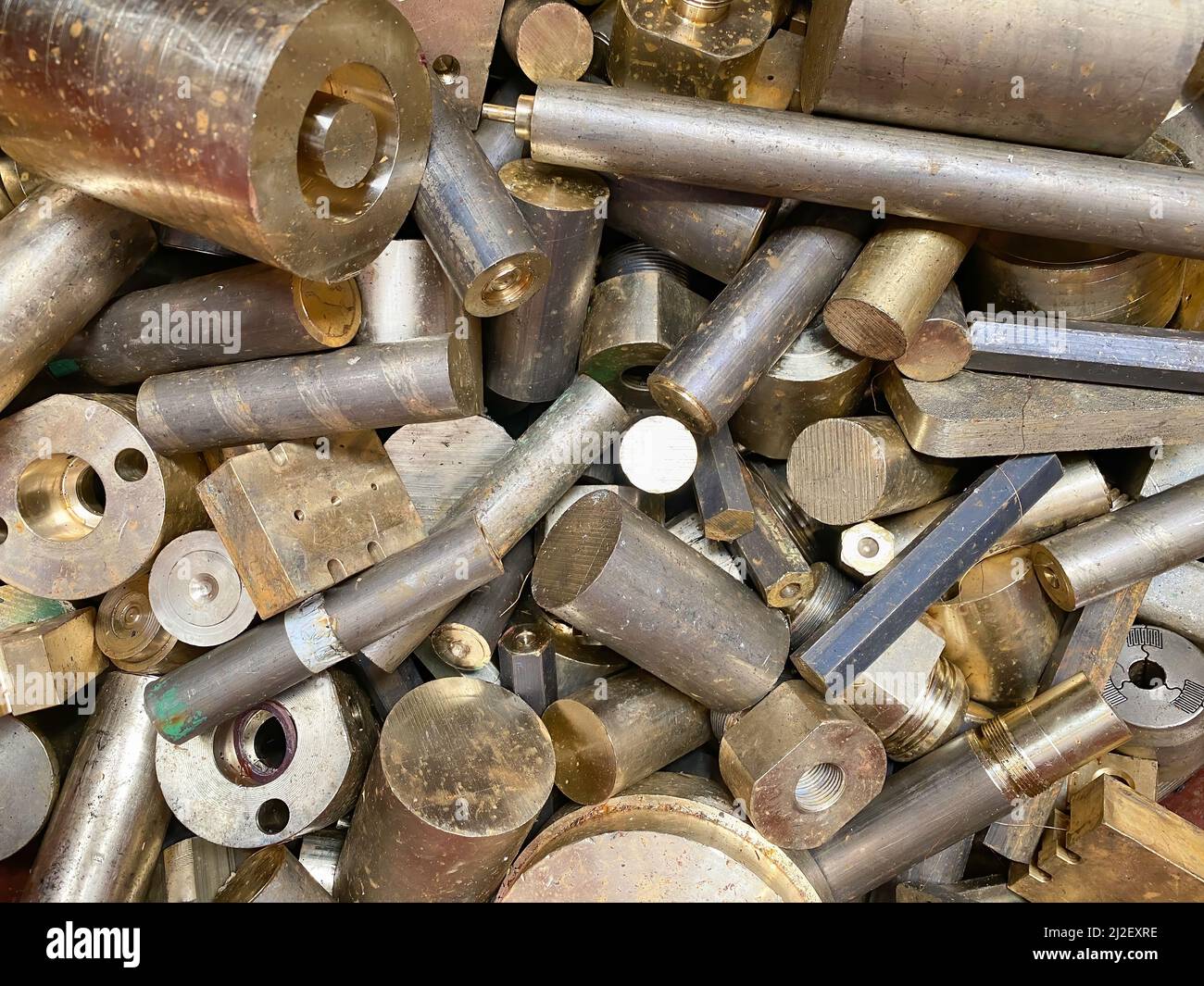 https://c8.alamy.com/comp/2J2EXRE/metal-products-in-the-factory-scrap-brass-rods-rejects-high-quality-photo-2J2EXRE.jpg