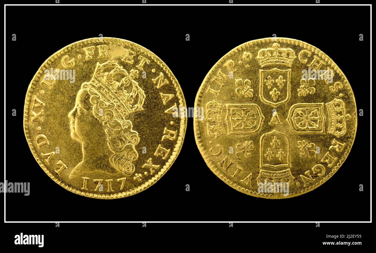 Gold Coins Two Louis d'Or (1717), depicting Louis XV of France Old historic French gold coins from the National Numismatic Collection, National Museum of American History USA Stock Photo