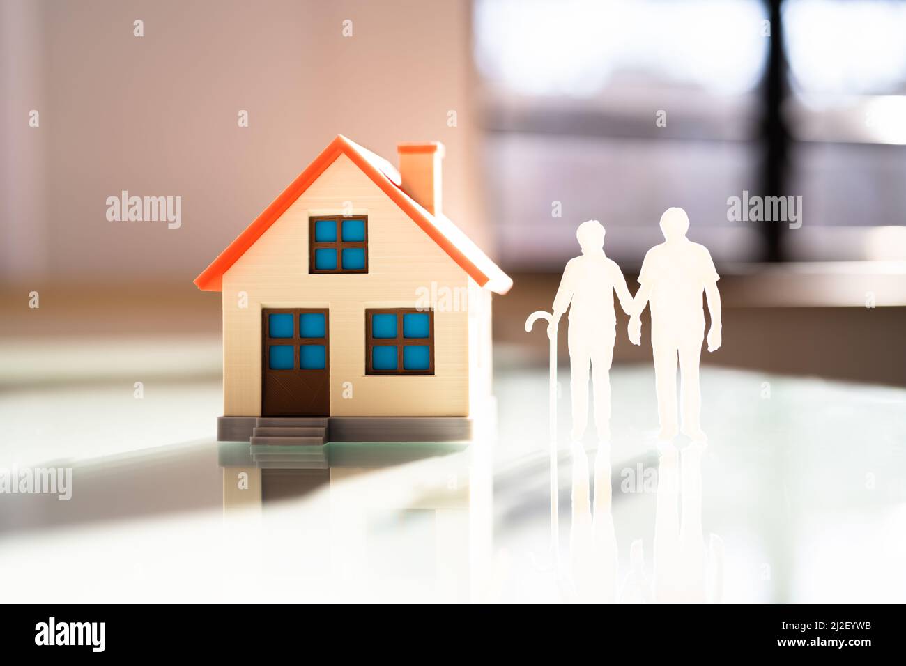 Senior Couple Standing Together Outside Their New House Stock Photo - Alamy