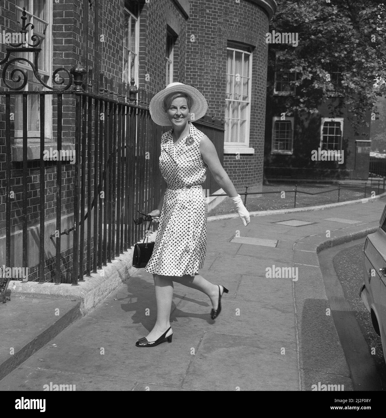Mrs Barbara Stonehouse, wife of John Stonehouse, Labour-Co-operative MP for Wednesbury, Staffordshire, arrives at 10 Downing Street, London, for the party given by Mrs Harold Wilson for the wives of members of both Houses of Parliament.  The party was the first of two such events, which have now become customary before Parliament rises for the summer recess. Stock Photo