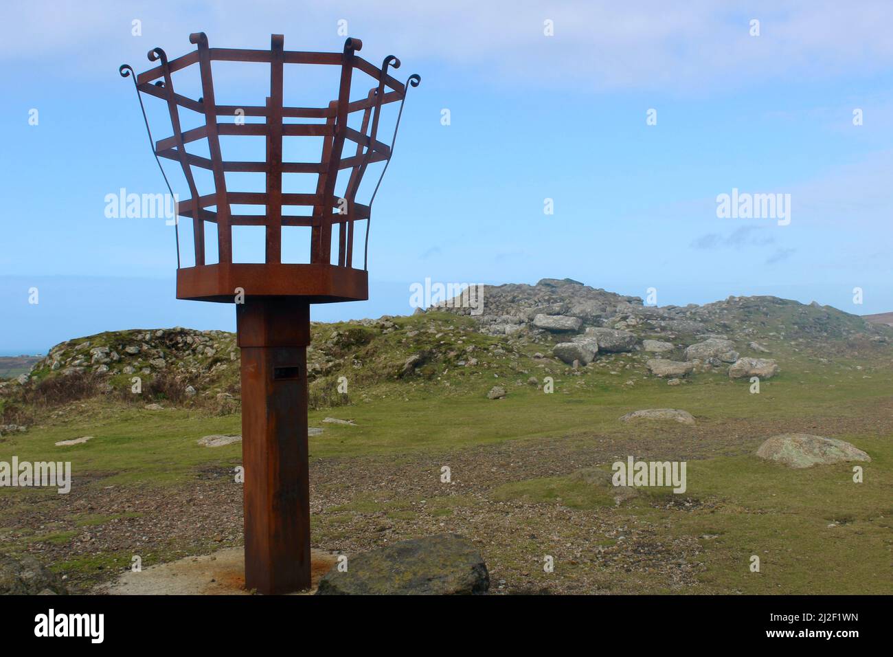 Chapel Carn Brea hilltop with fire basket. Once used as early warning system of impending Spanish Armada invasion. Now mid-summer festivities site. Stock Photo