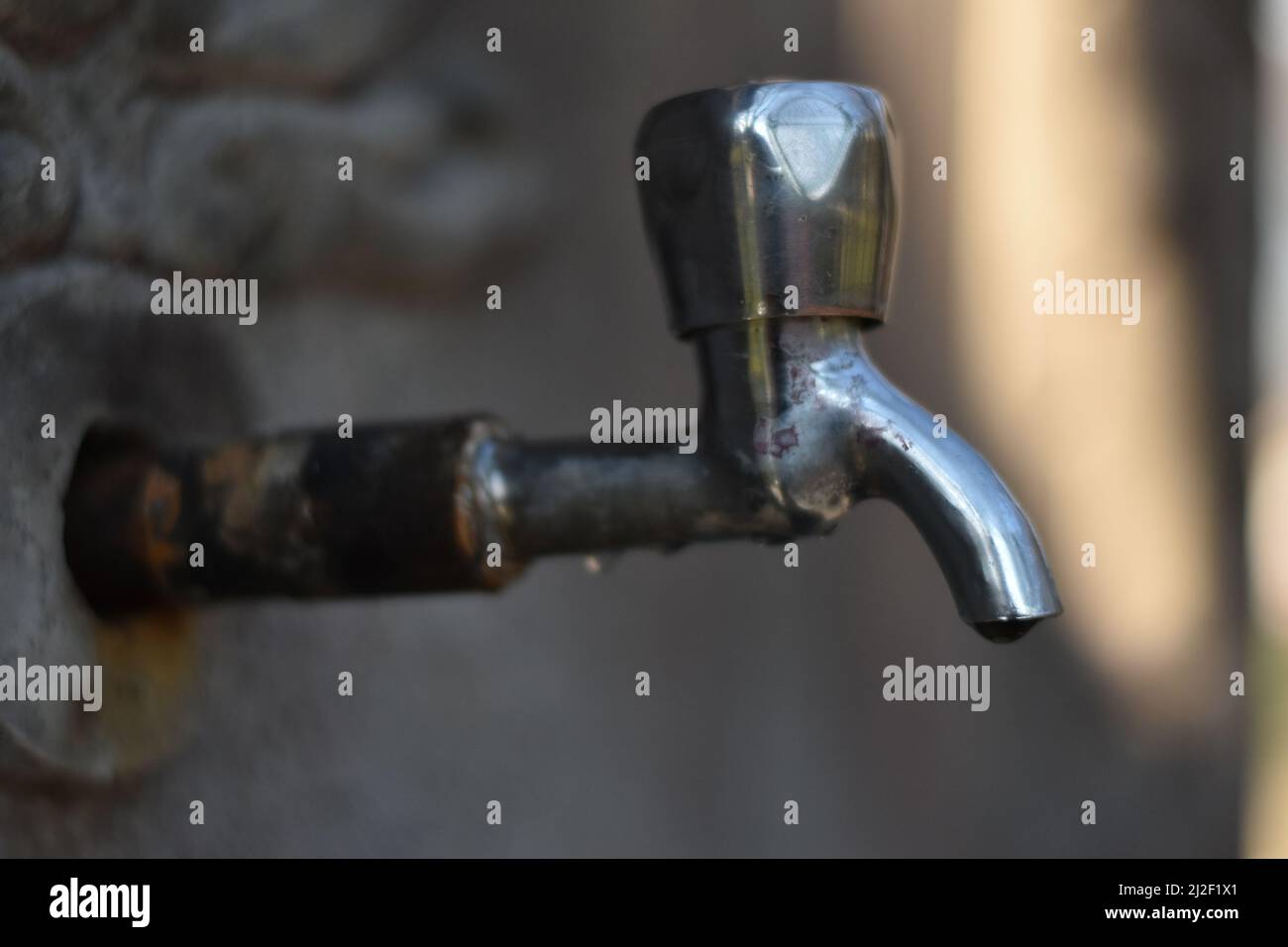 water tap of a public fountain Stock Photo Alamy