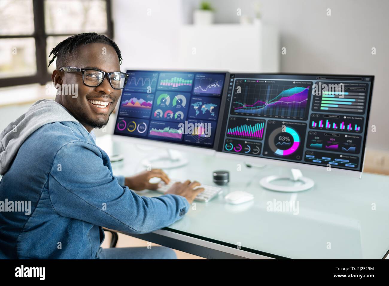 Analyst Man Looking At Business Data Analytics Dashboard Stock Photo