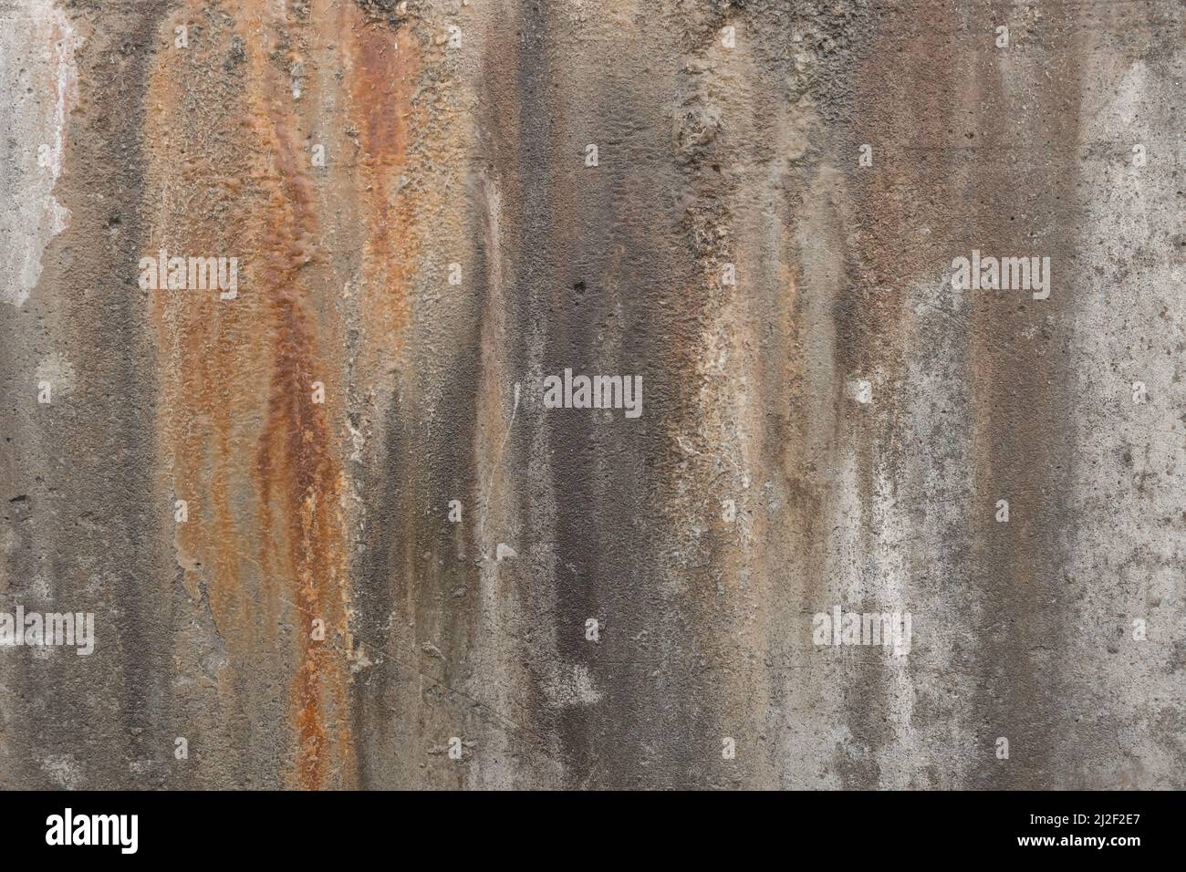 Old dirty concrete wall weathered surface cement chapped abstract obsolete background texture pattern outdated. Stock Photo