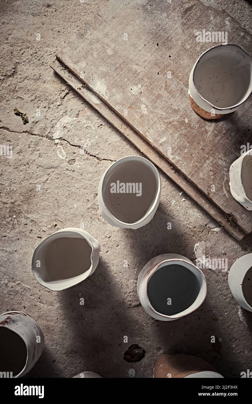 handmade ceramics, empty craft ceramic cup on gray background Stock Photo