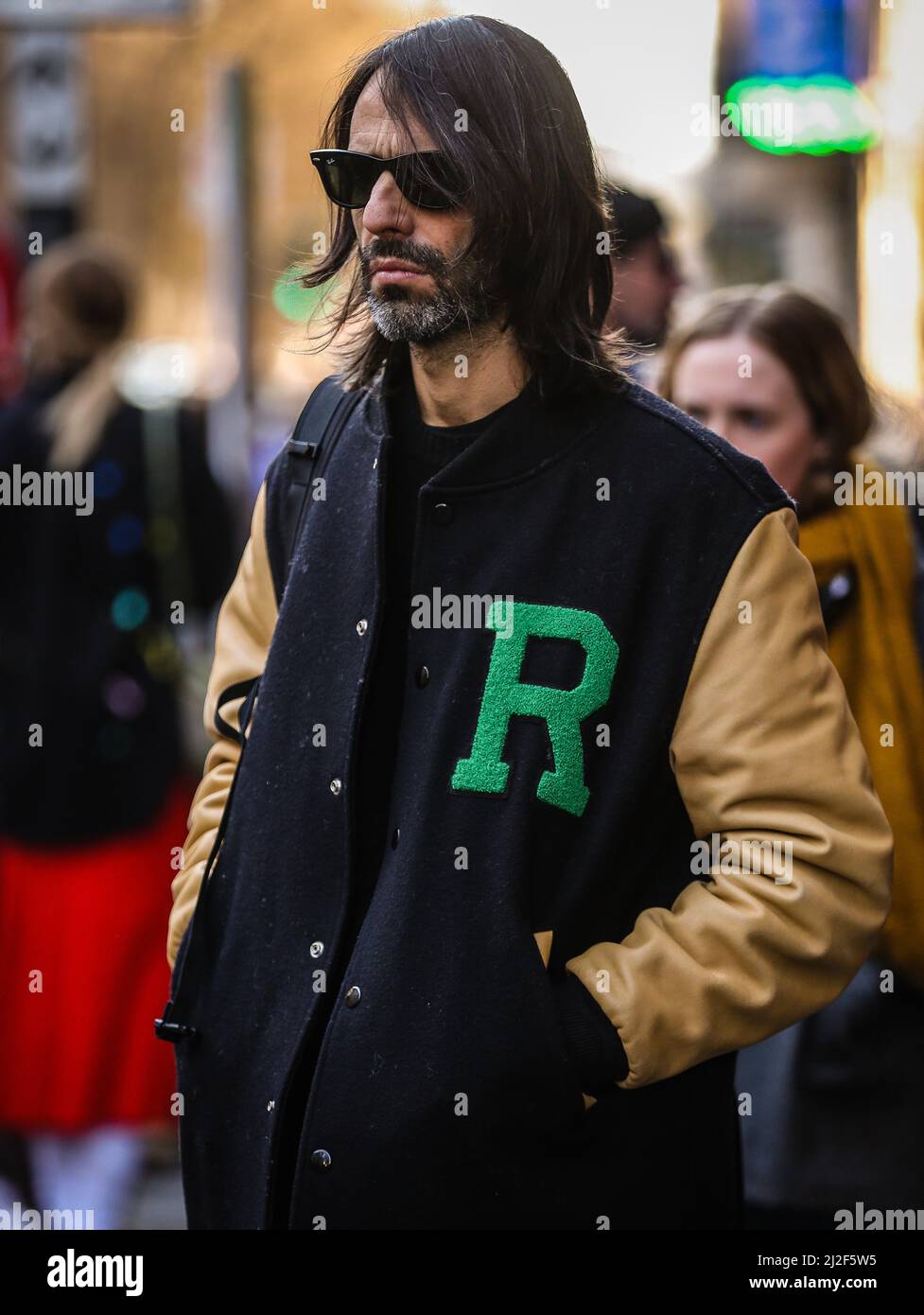 MILAN - SEPTEMBER 20: Man with black Louis Vuitton backpack and black and  golden Adidas jacket before Alberto Zambelli fashion show, Milan Fashion  Wee Stock Photo - Alamy