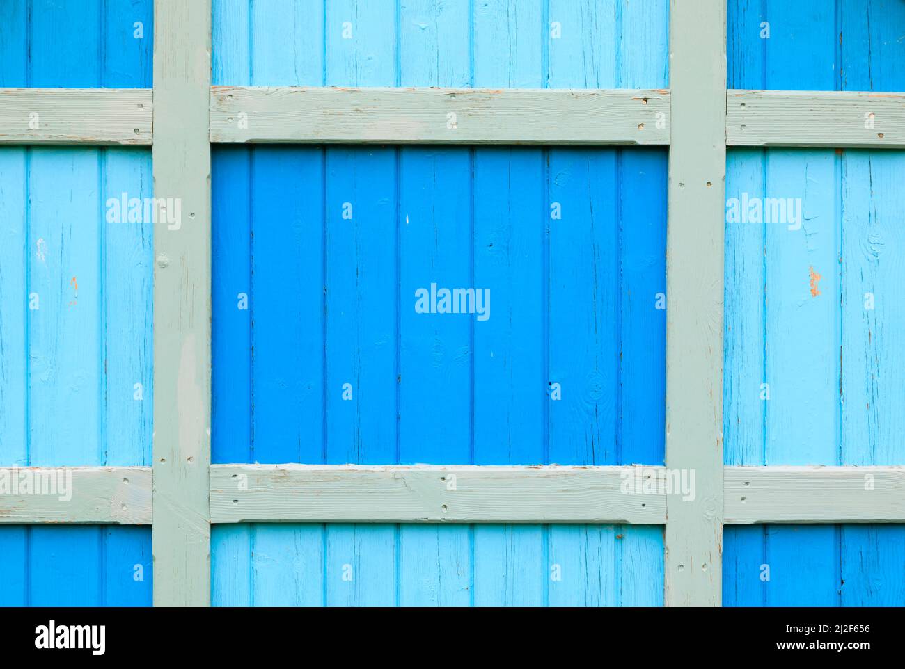 Coloured shades of blue, wood panels on beach hut, Herne Bay, Kent, England Stock Photo