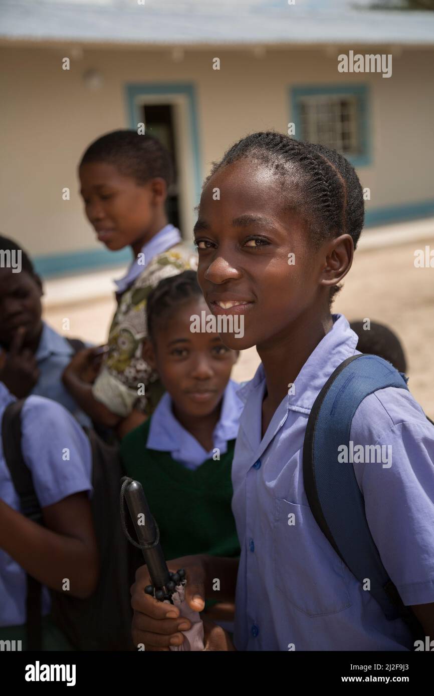 Girl students stand together in the courtyard of their primary school in Oshana Region, Namibia, southern Africa. Stock Photo