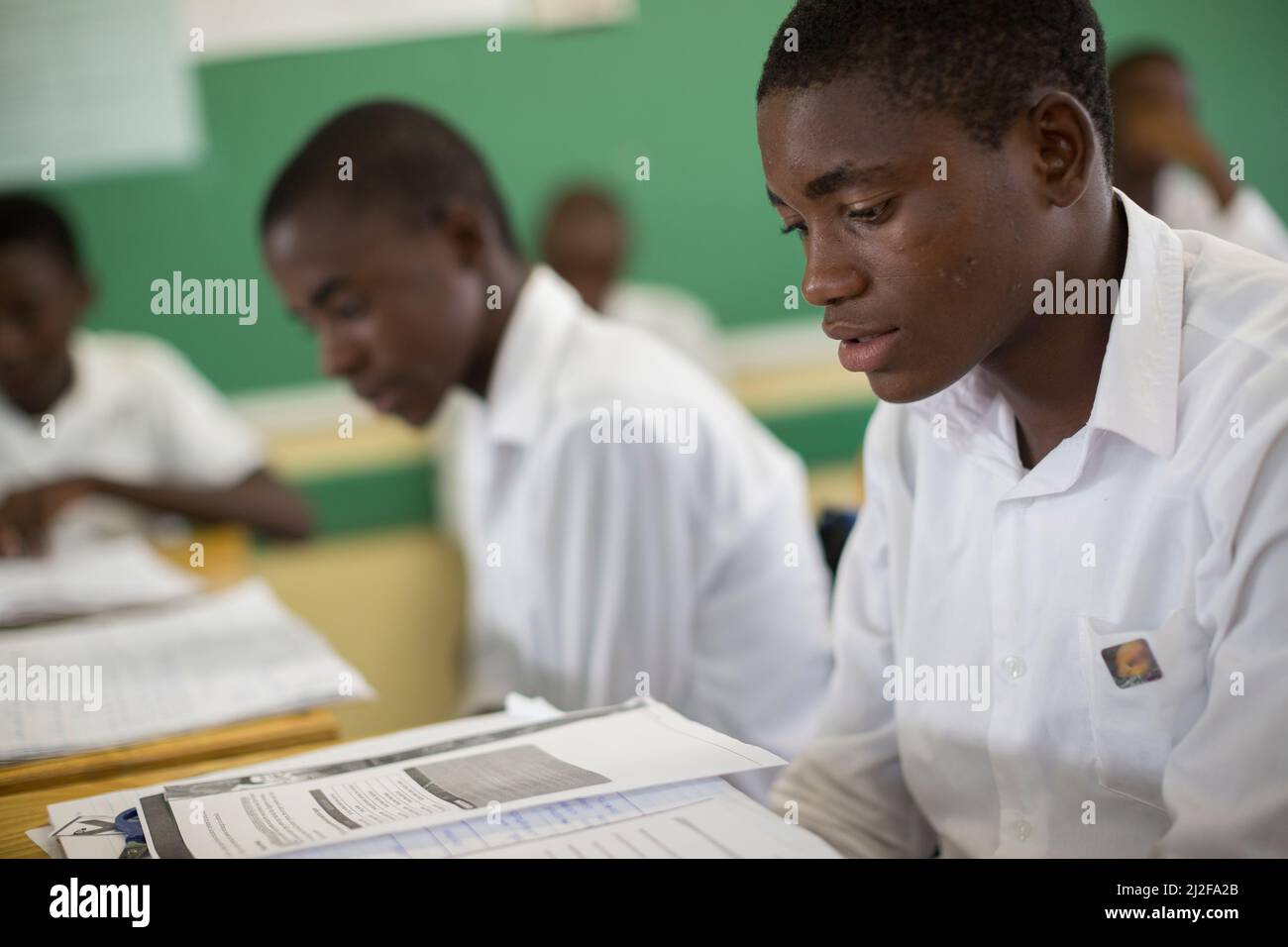 Secondary school students learning at desks in classroom in Oshana Region, Namibia, southern Africa. Stock Photo