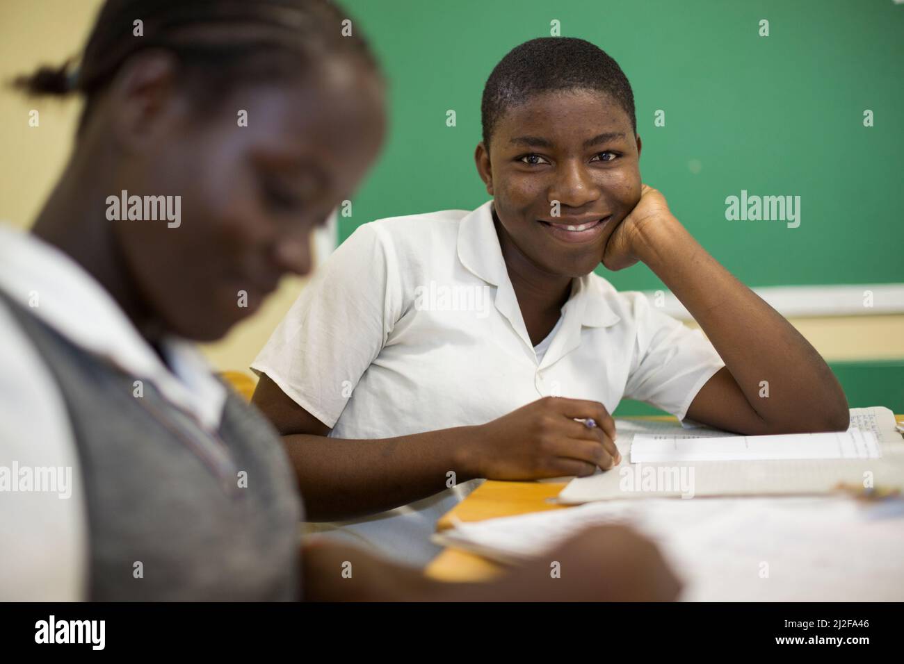 Secondary school students learning at desks in classroom in Oshana Region, Namibia, southern Africa. Stock Photo