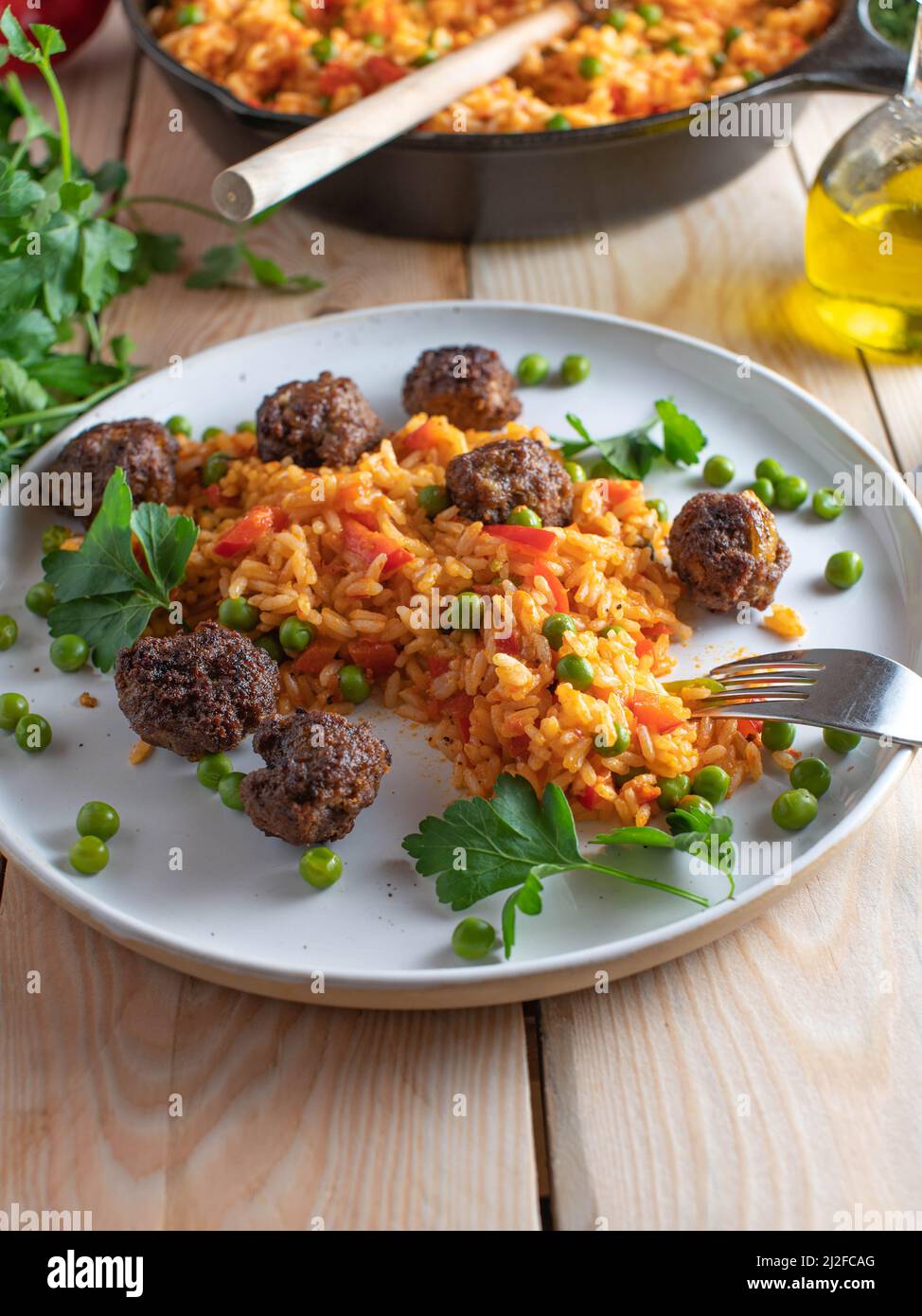 Vegetable rice with spicy meatballs. Traditional serbian rice dish ...