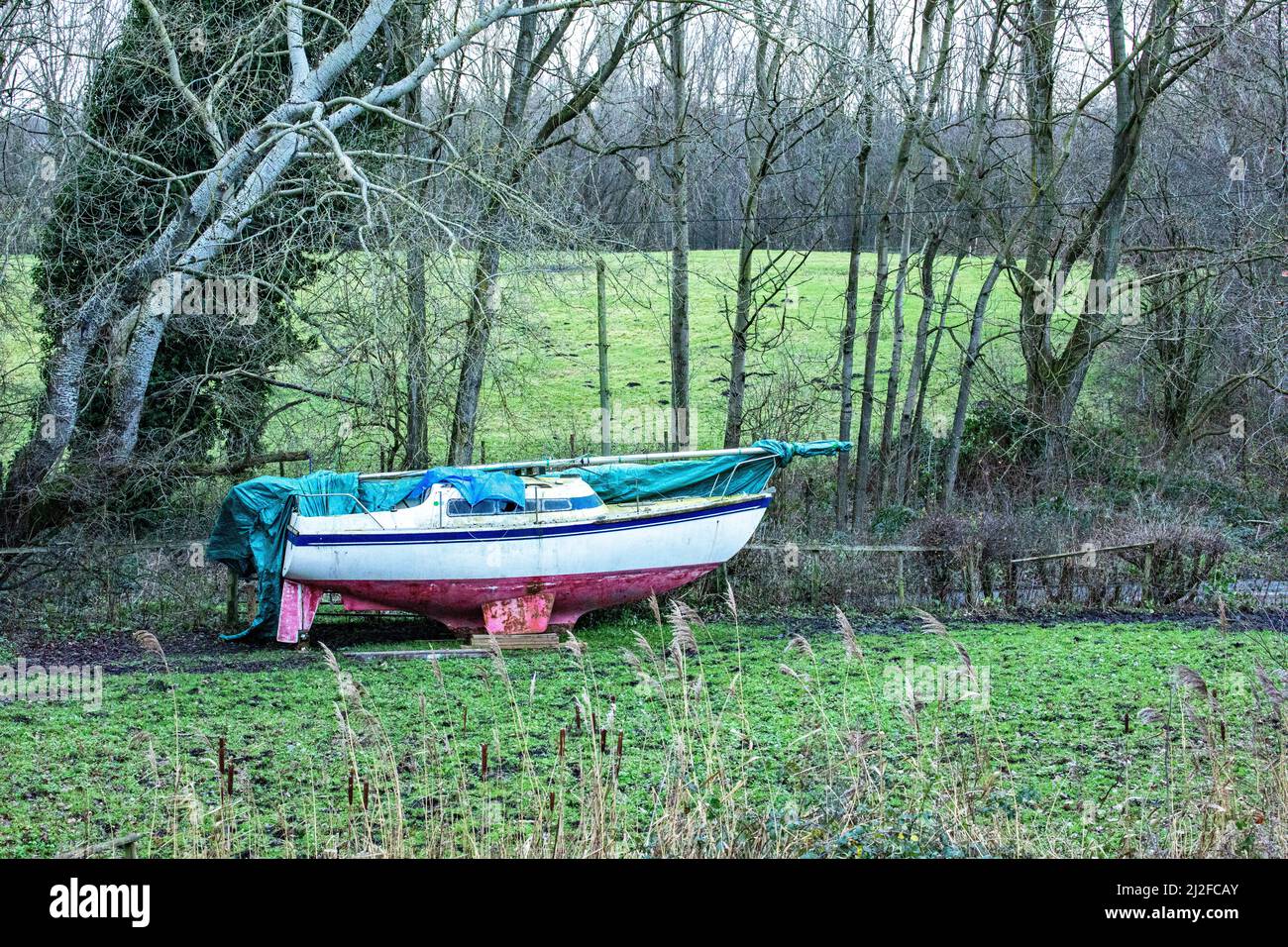 Sailing boat stored in the Cheshire countryside Stock Photo