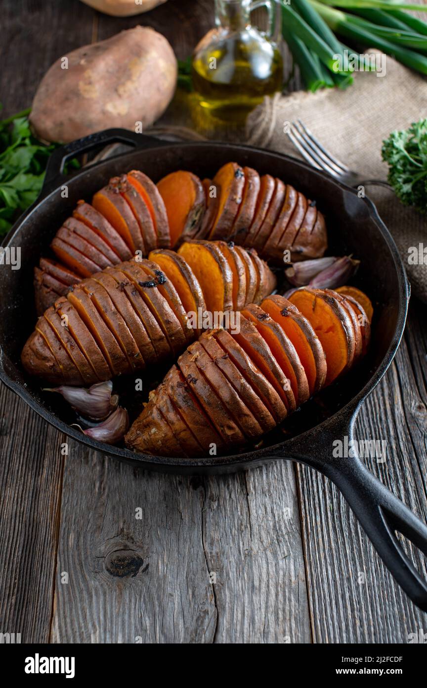 Healthy potato side dish with oven baked sweet potatoes cooked with
