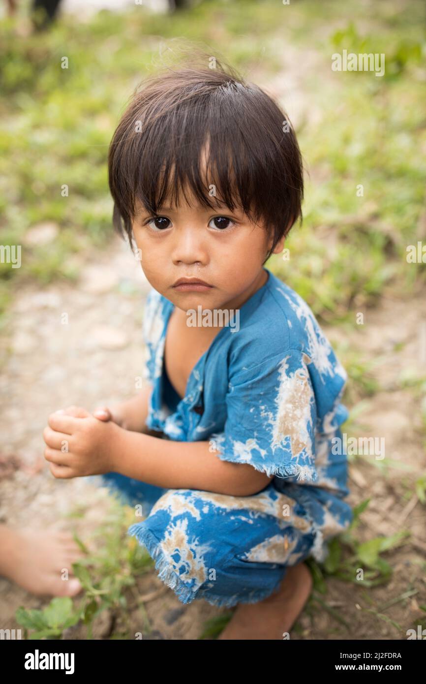 Sad young boy child on the island of Sulawesi, Indonesia, Asia. Stock Photo