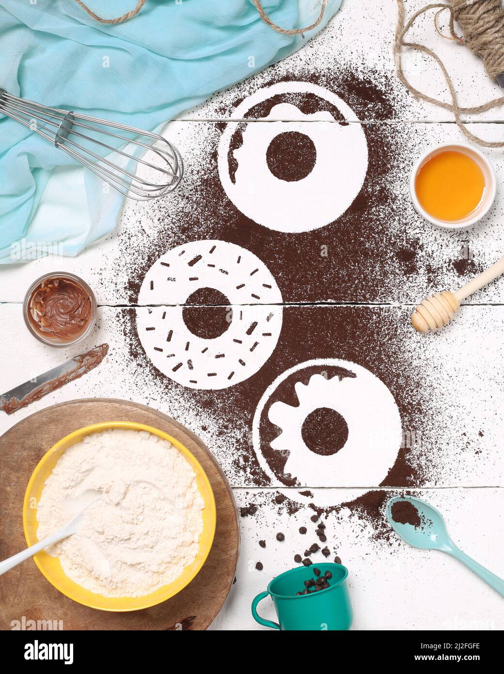 a vertical top view shot of donut silhouette on white wood table Stock ...