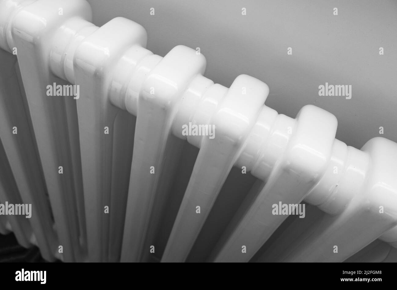 White radiator close up photo. Modern house heating technology Stock Photo