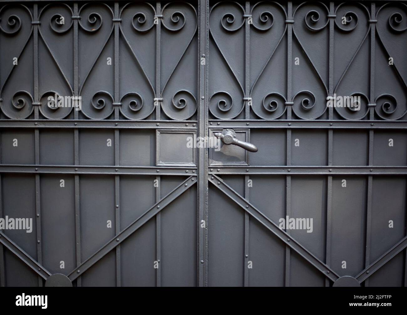 Stylish wrought iron grey gate Stock Photo Alamy