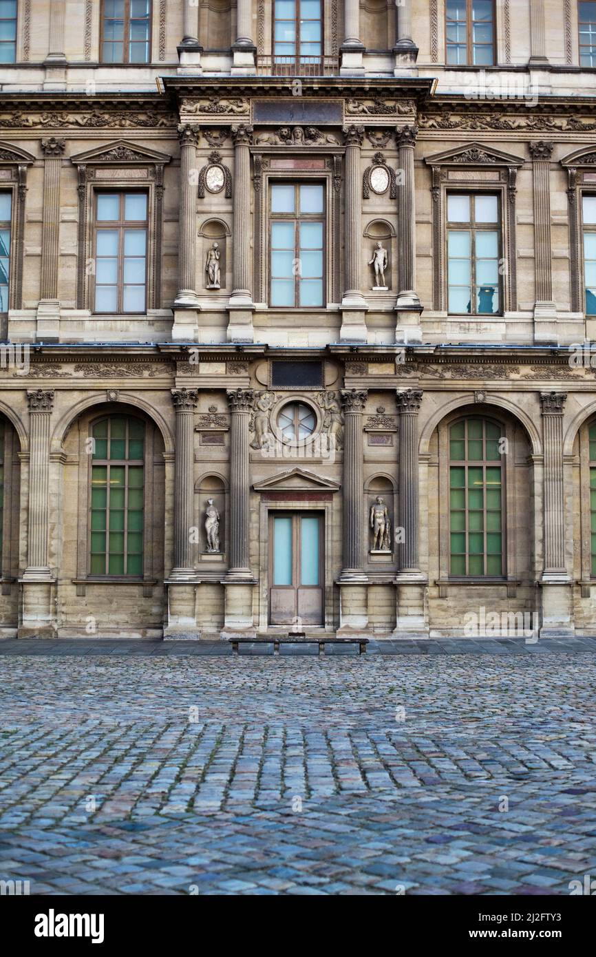 Facade of Palais du Louvre in Paris Stock Photo