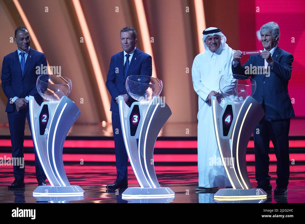 Bora Milutinovic holds up European Play Off (Ukraine/Scotland/Wales) after drawing them out of Pot 4 before being drawn into Group B with England during the FIFA World Cup Qatar 2022 Draw at the Doha Exhibition and Convention Center, Doha. Picture date: Friday April 1, 2022. Stock Photo