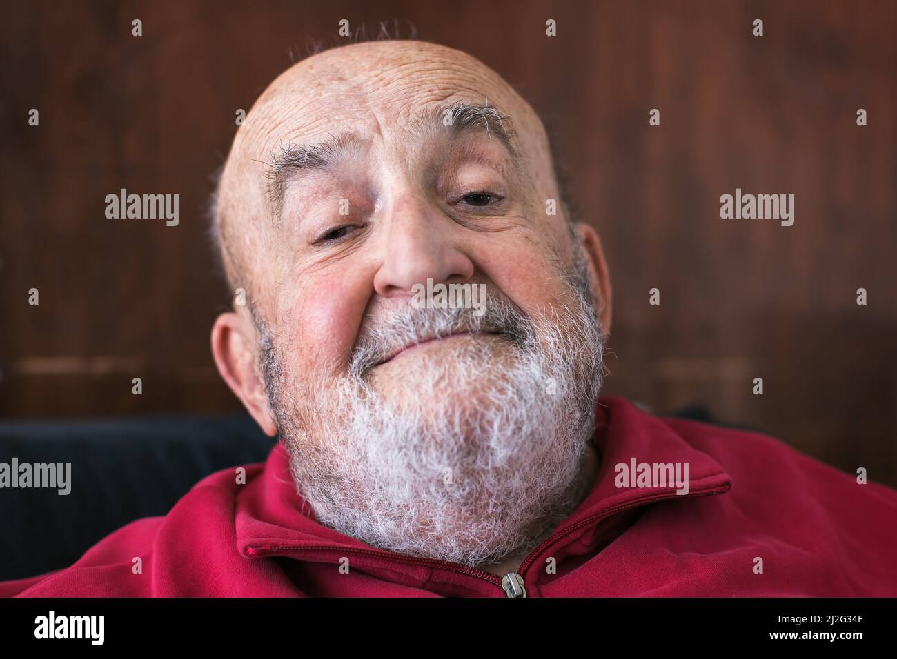 portrait of content funny old man Stock Photo
