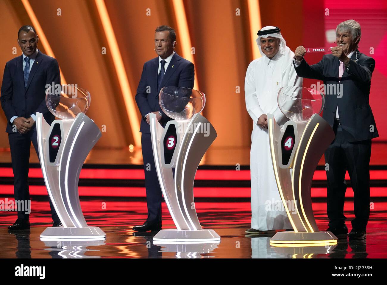 Bora Milutinovic holds up Canada after drawing them out of Pot 4 during the FIFA World Cup Qatar 2022 Draw at the Doha Exhibition and Convention Center, Doha. Picture date: Friday April 1, 2022. Stock Photo