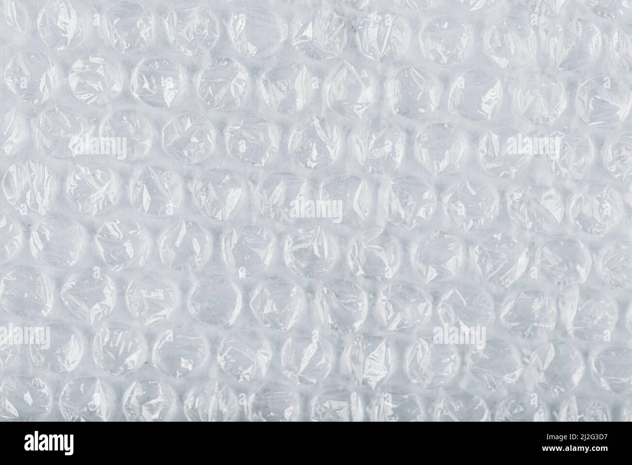 Packing bubble wrap for parcels on a White background in full screen Stock Photo