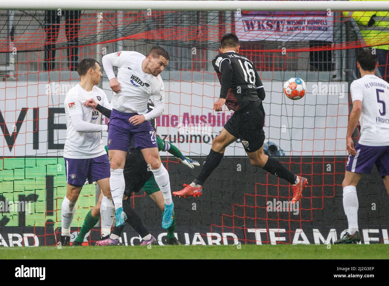 Ingolstadt, Germany. 01st Apr, 2022. Soccer: 2. Bundesliga, FC Ingolstadt 04 - Erzgebirge Aue, Matchday 28, Audi Sportpark. Visar Musliu of Ingolstadt (r) scores to make it 2:0. Anthony Barylla of Erzgebirge Aue cannot keep the ball out on the left. Credit: Matthias Balk/dpa - IMPORTANT NOTE: In accordance with the requirements of the DFL Deutsche Fußball Liga and the DFB Deutscher Fußball-Bund, it is prohibited to use or have used photographs taken in the stadium and/or of the match in the form of sequence pictures and/or video-like photo series./dpa/Alamy Live News Stock Photo