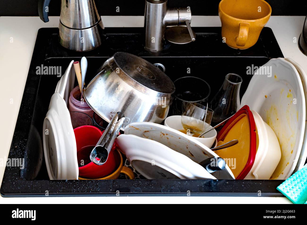 A closeup shot of dirty dishes in a sink Stock Photo - Alamy