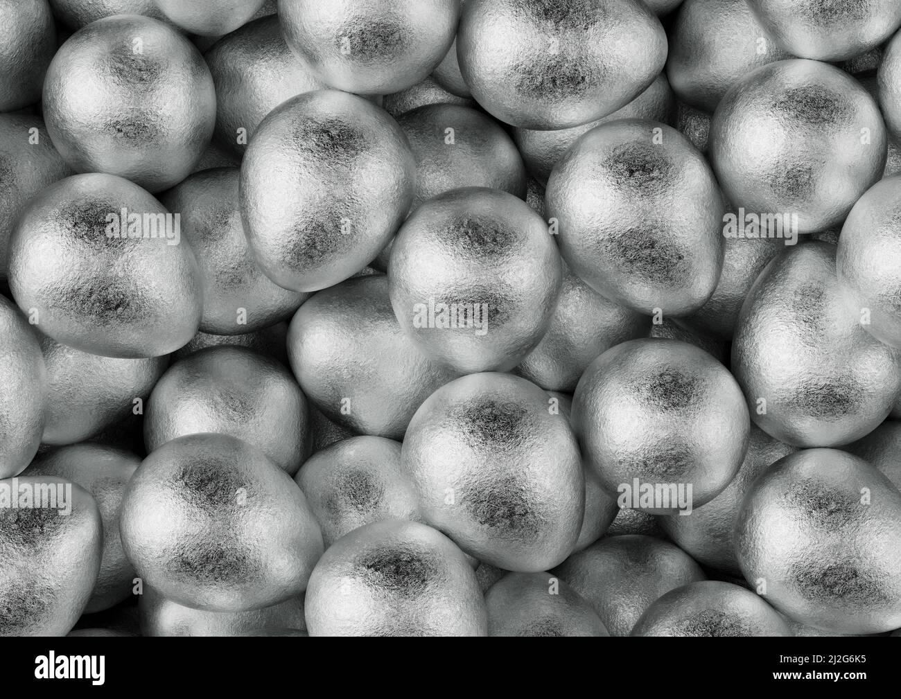 Chocolate easter eggs with silver Aluminium foil. Wallpaper. backdrop