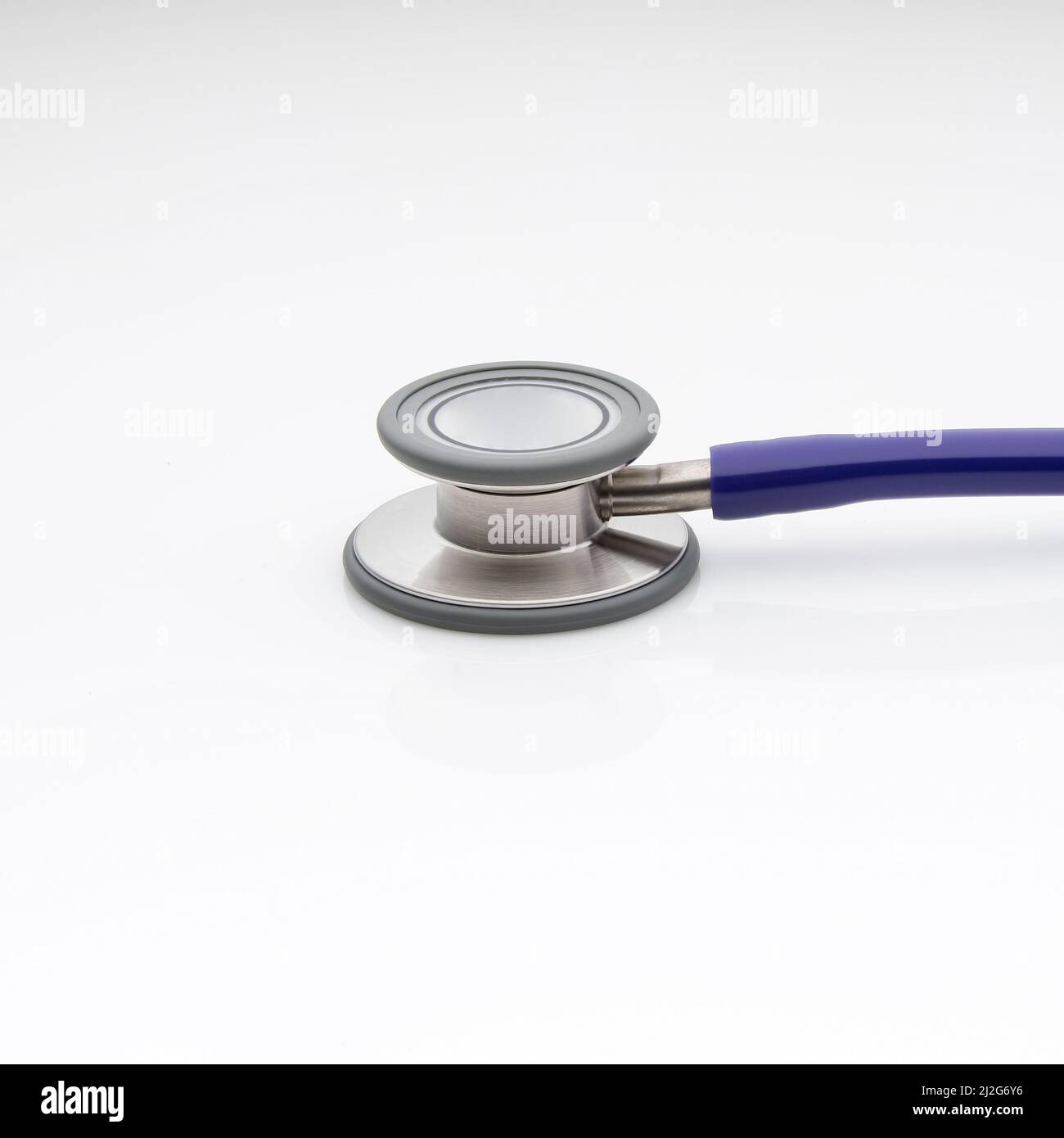 A medical stethoscope to listen the lungs and heart isolated on white